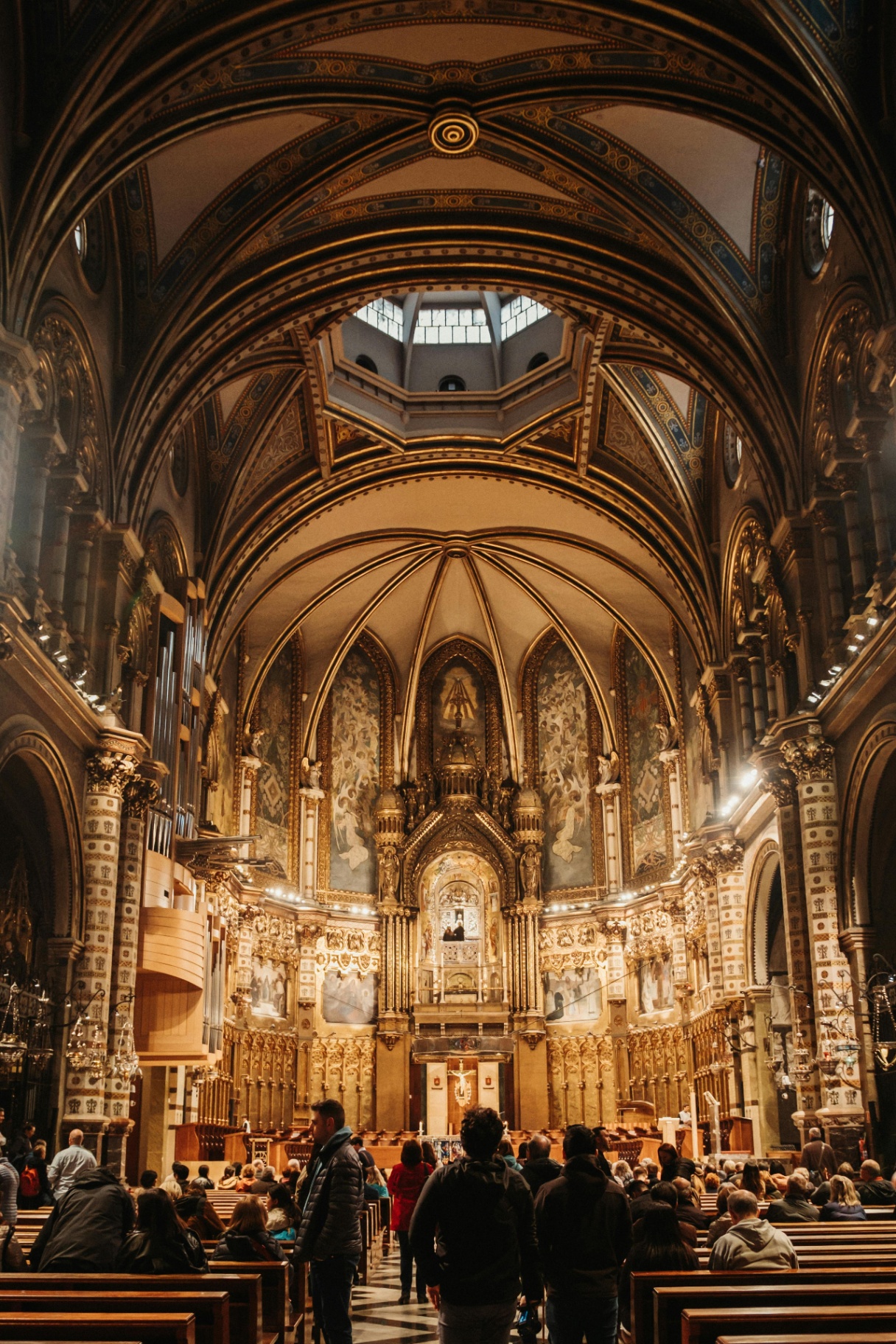 Inside the basilica — candles, marble, stillness.